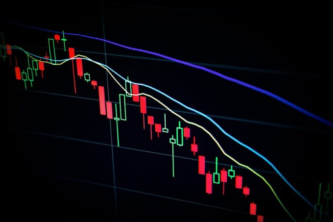 Investment professional analysing financial market data