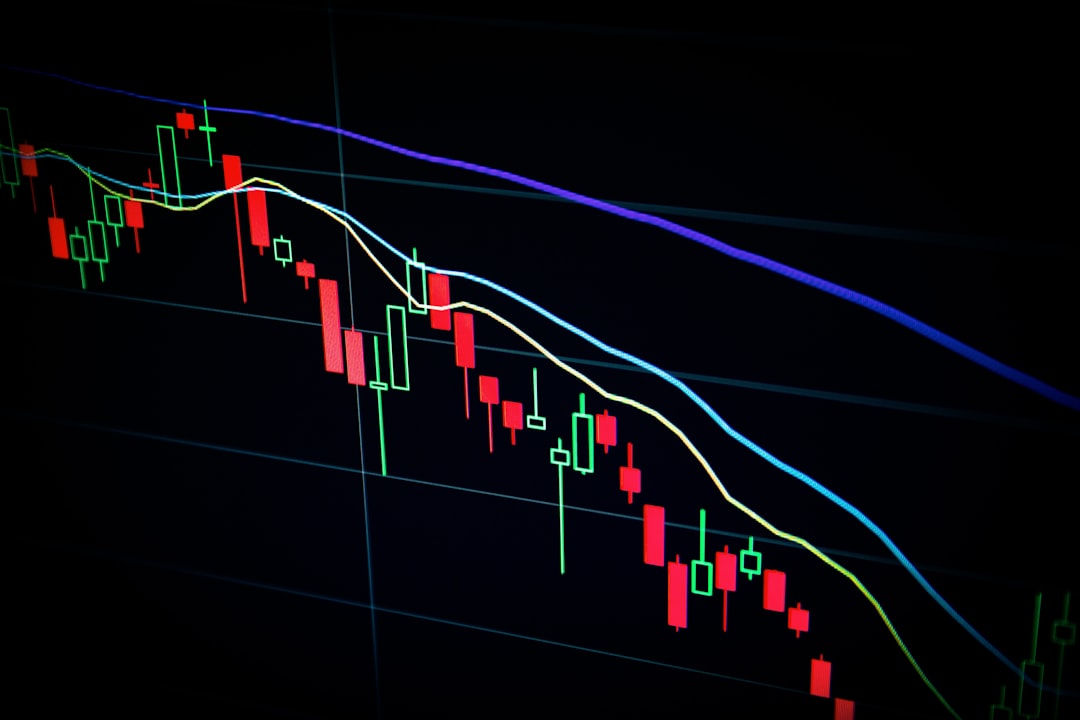 Investment professional analysing financial market data